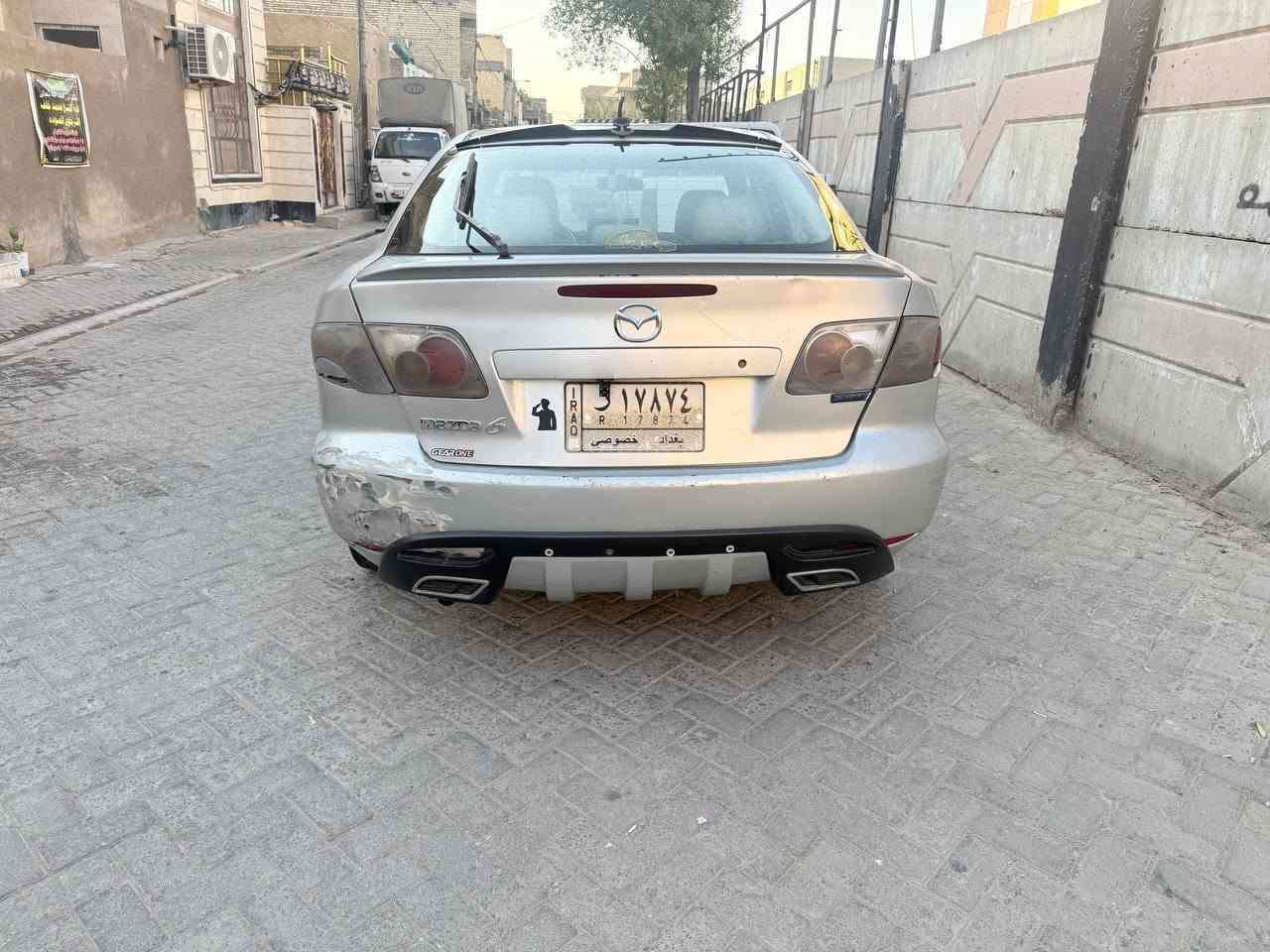 مازدا ياباني وارد خليجي اوتماتيك 
زوم 6 موديل 2003 محرك 2000 
رقم بغداد 
سيارة بلادية بدون صبغ 
محرك كير خير من الله
مشط ستيرن جديد 
كهربائيات كلهة شغالة
تبريد شغال 
مكانهة بغداد 
سعر 44 
هاتف ***********
