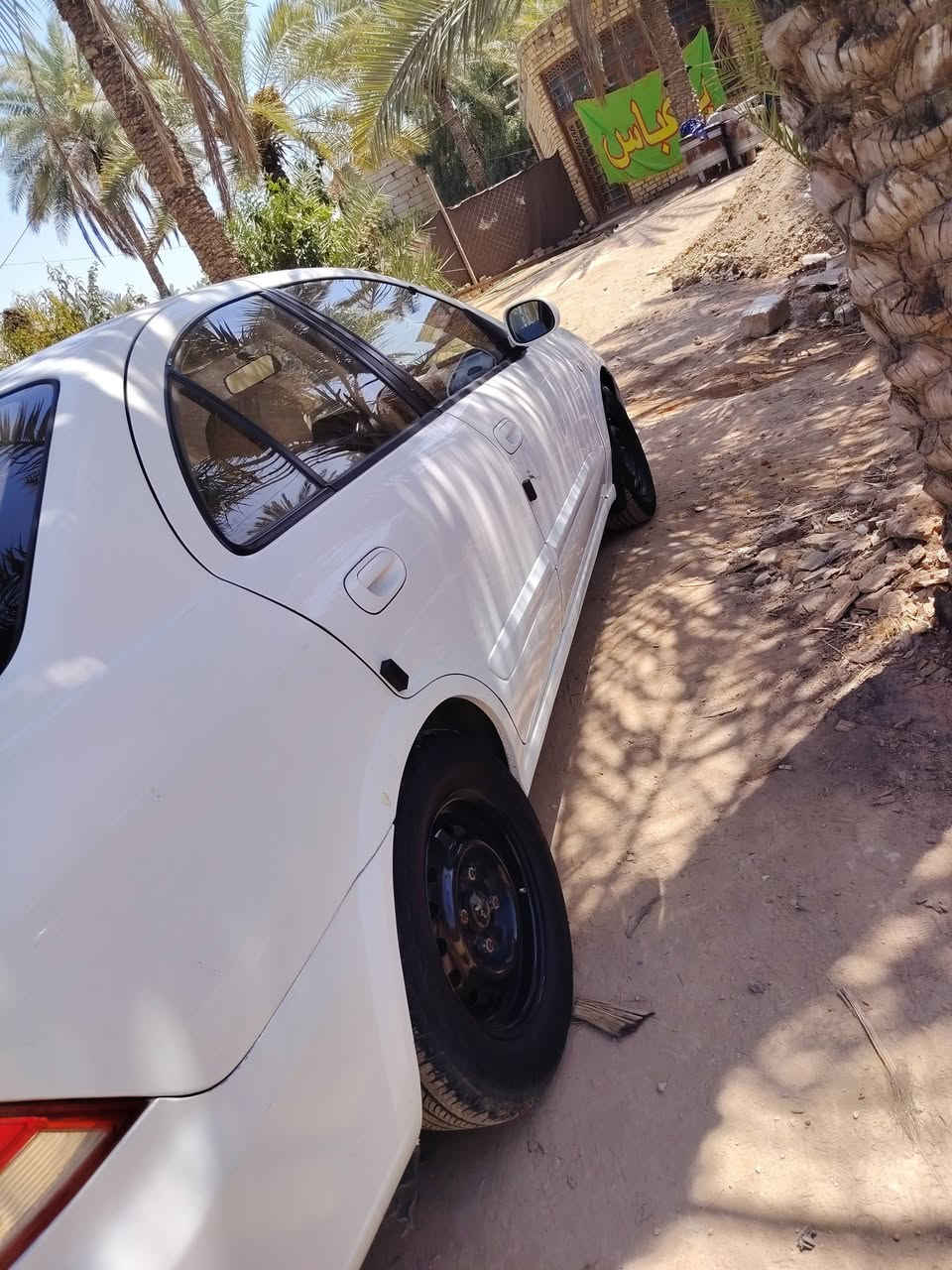 نيسان موديل 8 اوتو قبق اسود نصبتها كلش حلوة بيها بس جنطة والجاملغ الخلفي رقم نجف(***********)
