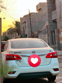 عندي نيسان سنتر ماشي ٢٦ ألف ضمان شركه سور رقم بغداد سياره جديده بسمي م...