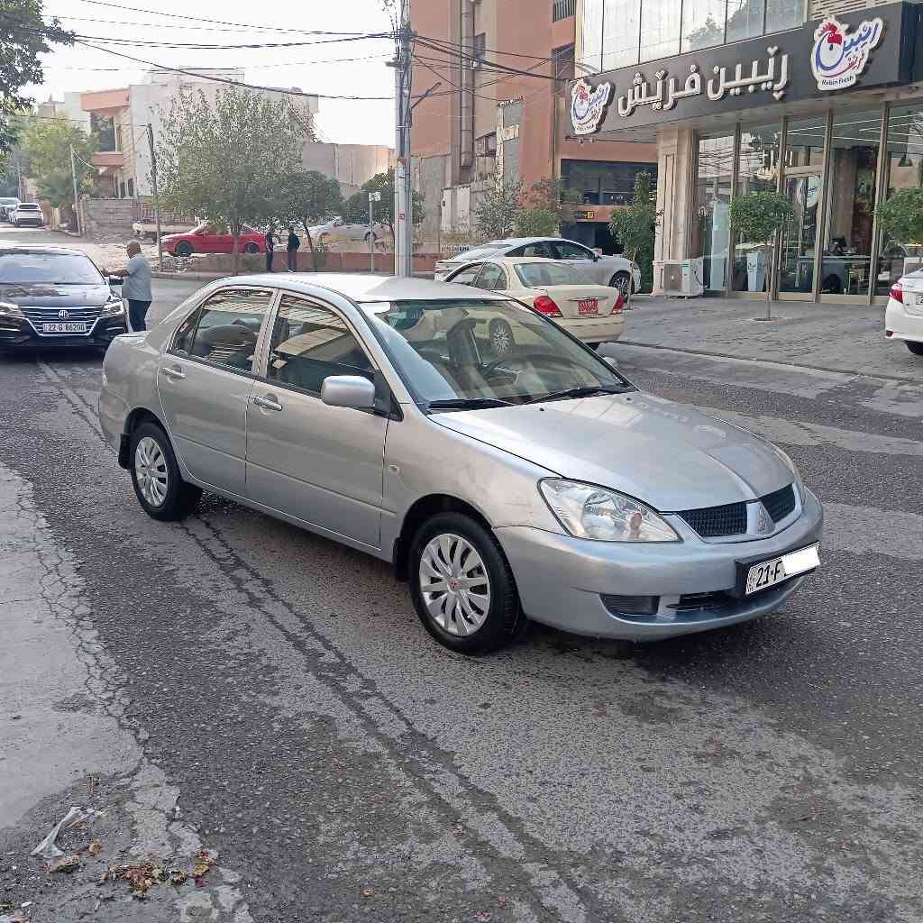 لانسر • ٢٠١١ • اوتوماتيك
