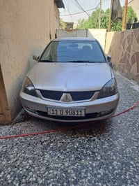 لانسر موديل 11 مكينه 2000 كير اوتوماتيك مكفوله عده الهلالات تخم تاير ج...