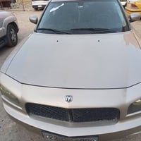 سياره جارجر مديل 2010 بدون خسل وصرته سياره جديده بمعنى الكلمه كير مكين...