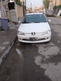 بيجو 306 • أبيض • بأسمي