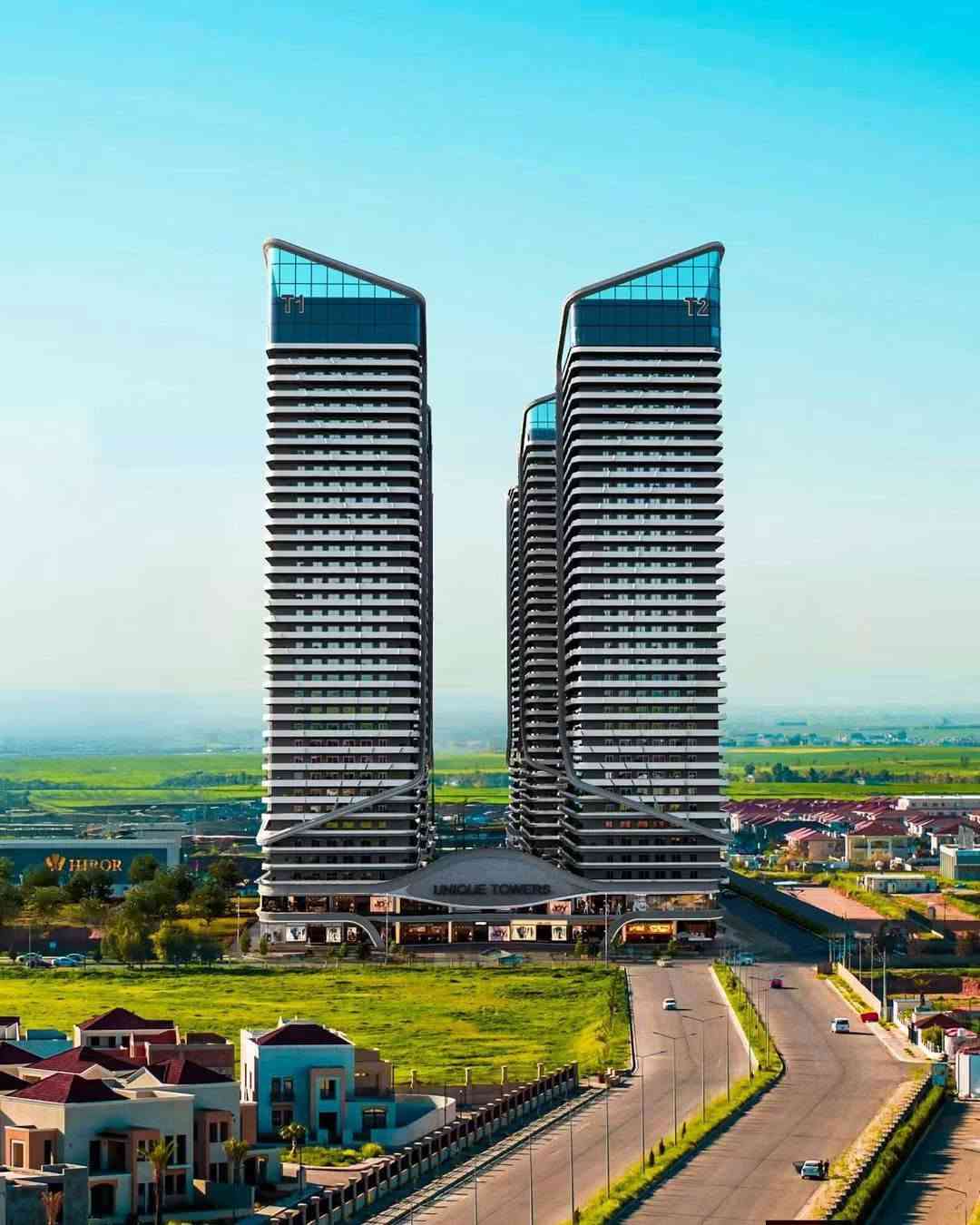 🏢 مشروع "يونيك تاورز" على طريق المصيف – رفاهية السكن والاستثمار الأضمن بنظام التقسيط المريح!

فرصة لا تتكرر لتملك شقتك الذكية في واحد من أحدث وأرقى المشاريع المعمارية في أربيل، المصمم وفق أعلى المعايير العالمية ليمنحك البيئة المثالية للاسترخاء والعيش الهادئ.

مميزات المشروع:
🔹 بناء ذكي وآمن: 6 مباني حديثة تتيح لك التحكم بكامل الشقة عن بُعد، ومصممة بمقاومة عالية للزلازل (أكثر من 7 درجات ريختر).
🔹 ارتفاعات وإطلالات مميزة: يتكون كل مبنى من 39 طابقاً بإطلالات متعددة وخلابة.
🔹 مساحات متنوعة: تتوفر شقق تبدأ من (غرفة وصالة) وتصل إلى (4 غرف وصالة) لتلبي احتياجات جميع العوائل.
🔹 بيئة خضراء ورفاهية متكاملة: 60% من مساحة المشروع مخصصة للمساحات الخضراء، مع قاعات رياضية متطورة، مسبح، وملعب تنس.
🔹 خدمات ومواقف متطورة: 4 طوابق أرضية (بارك ذكي) مزودة بمحطات شحن للسيارات الكهربائية، إضافة إلى طابقين تجاريين لتلبية كافة الاحتياجات.
🔹 ملكـية مضمونة: العقار (طابو صرف).

ضمانات وامتيازات الشراء:
💰 بدون أي مصاريف مخفية: عند إتمام العقد، يدفع المشتري السعر المقرر فقط دون تحميله أي رسوم إضافية (معفي من أجور تحويل الملكية وعمولة الشركة).
👁️ معاينة واقعية: تتوفر نماذج شقق جاهزة داخل الموقع للتعرف عن قرب على جودة البناء وتفاصيل التشطيبات.

📲 اتخذ القرار وسارع بالحجز الآن.. الصفقة لا تُعوض!
للحصول على التفاصيل الكاملة أو ترتيب زيارة ميدانية للمشروع لرؤية الواقع بنفسك:
📩 راسلنا عبر رسائل الصفحة
📞 أو اتصل بنا مباشرة / واتساب: 
***********
***********

🔔 لا تنسَ متابعة الصفحة ليصلك كل جديد أولاً بأول. أربيل, العراق

نص مكتوب في الصور:
- UNIQUE TOWERS
- الحياة الذكية تبدأ بصوتك.
- UNIQUE TOWERS منزل يفهم احتياجاتك ويصمم لك الحياة المثالية. أليكسا، أطفئ الأضواء
- منزل أذكى بين يديك Hi, Living Room Dining Kitchen Smart Light Smart AC Music Give a Little Tall Prepare Breakfast Curtain