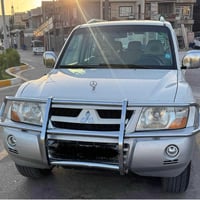 باجيرو 2006 حبتور رقم بغداد الجديد انكليزي مع هزه جديده  السياره مكفول...