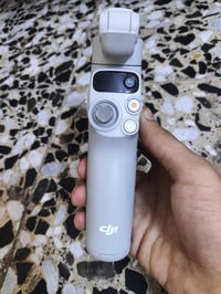 اوزمو dji  شغال بدون اي عيب فقط نقه  قطعة الي يقعد بيه تليفون رايدة ب ...