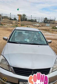 لانسر ٢٠١١ • مكينة ١٦٠٠ • اوتوماتيك