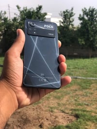 بوكو X4 برو • شاشه مكسوره • تلفون مرتب