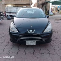 سياره بيجو 307 موديل 2006 السيارة بدون اي ضربة ولا تبديل رقم بغداد تبر...