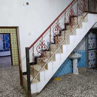 بيت للايجار • طابقين • خلف مدينه حمورابي