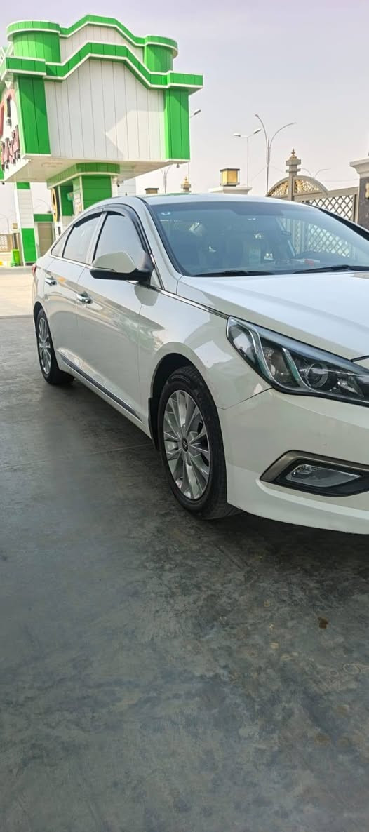 ابيض • محرك 2400 • رقم بغداد