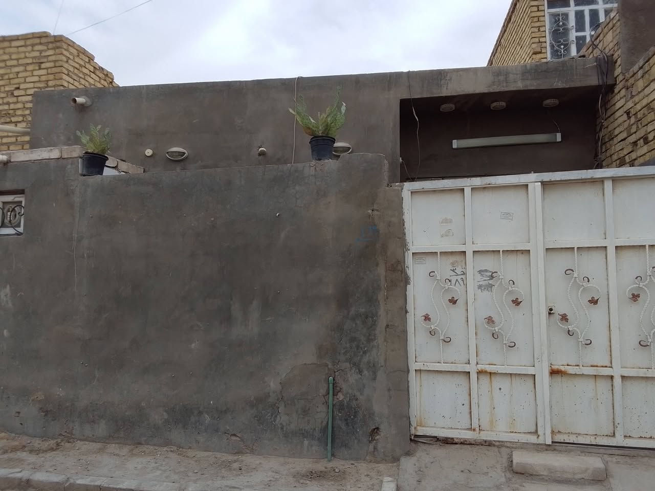 نجف شارع المطار • ٨٠م • صب كونكريت
