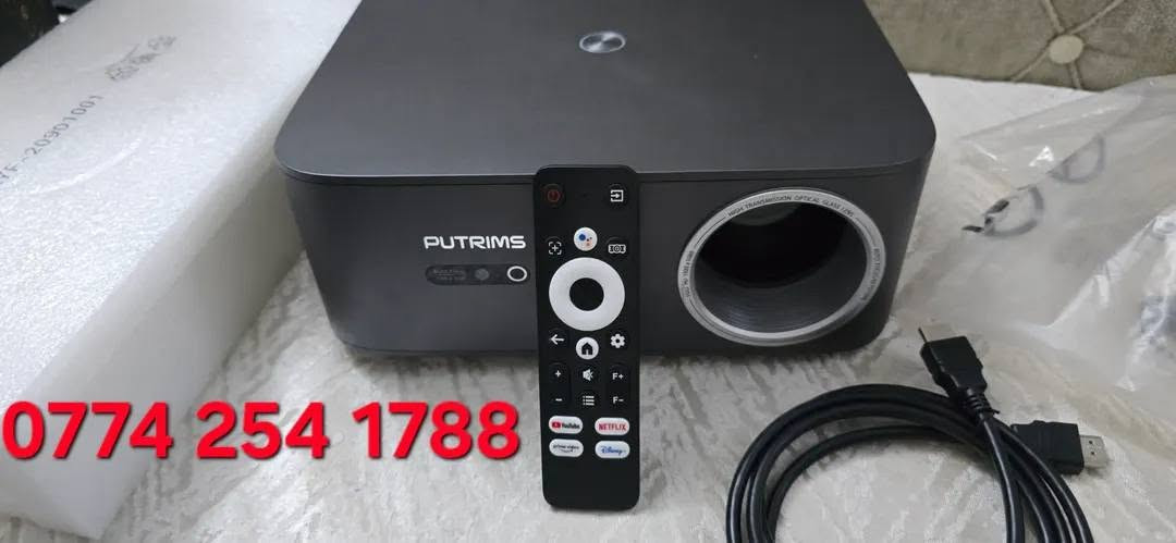 🔥🔥🔥جهاز العرض الضوئي PUTRIMS K12 (داتا شو)
✨️هو بروجكتر منزلي ومحمول عالي الأداء، يتميز بدقة عرض أصلية Full HD 1080p، ودعم تشغيل محتوى بدقة 4K، مع إضاءة قوية تناسب الغرف والاماكن الخارجيه منشا اوربي 🇩🇪🇩🇪🇩🇪
👇👇👇👇
اضاءه عاليه 25000:1
ansi 1500
40000 Lumins
✨️نظام اندرويد رسمي 
،✨️ويأتي مع منافذ متعددة مثل HDMI وUSB وخاصية ربط الهواتف الذكية.المواصفات الأساسيةدقة العرض: دقة أصلية 1920×1080 (Full HD) مع دعم فك تشفير فيديوهات 4K.السطوع والإضاءة: إضاءة عالية تدعم الوضوح حتى في وجود إضاءة متوسطة أو محيطة.حجم العرض: يقدم شاشة كبيرة تصل حتى 300 بوصة

الربط والاتصال: يدعم الواي فاي (انعكاس شاشة الهواتف أندرويد وآيفون)، البلوتوث للسماعات الخارجية، ومنافذ HDMI وUSB وAV.الملحق

☎️   ***********

نص مكتوب في الصور:
- W For you Live Apps Library Google TV Ultra Bright 4K Support Voice Control Your apps NETFLIX YouTube prime video CRave HBO tv+ Top picks for you
- *********** Ahmed DATA SHOW
- ***********
- ***********
- Bundled with Google TV Stick One-click access to massive contents Search Home Shop Discover Apps 2 M 8:35 YouTube prime video CRAVE Paramount+ HBOMax Spotify tv+ TVer tubi AbemaTV hulu twitch Google TV Hey Google Google Play