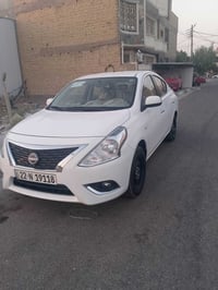 نيسان سني موديل 25مكفوله كفاله عامه رقم الهاتف 07734530141