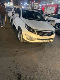 كيا سبورتج للبيع رقم بغداد موديل ٢٠١١خليجيه بيها صبغ ثلاث قطع صبغ  موا...