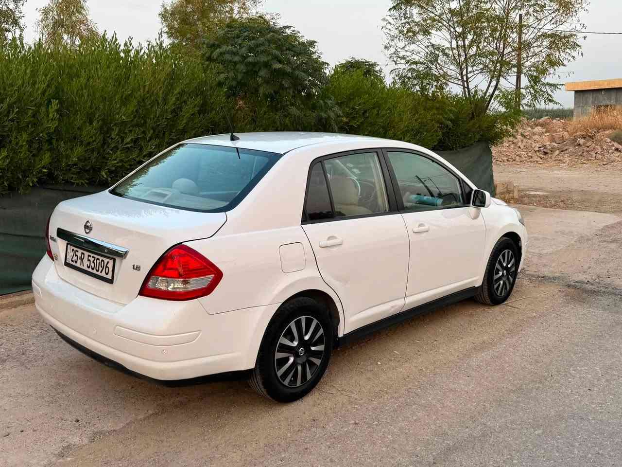 نيسان تيدا موديل 2012 خليجي محرك 18 جبير ماشيه 106  الف كيلومتر حقيقي رقم سنويه جديد بسمي بيهه شبرصبغ مكانين تعديل بارد بدون دواخل سياره جديده مكان داقوق***********
