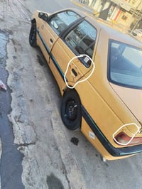 بيجو 405 لميس • ٢٠١٥ • رقم بغداد