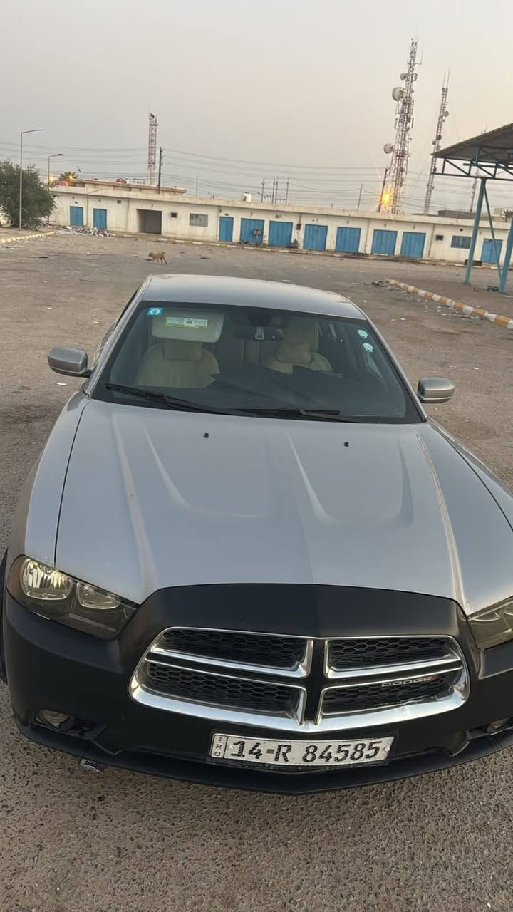 دوج جارجر 2011 مكينه وكير كفاله رقم بصره  تحويل وارد كندي شاشه جبيره گيجات سرعه خليجي 260 كفاله من الضربه صبغ اقل من شبر بلجاملغ الخلفي سياره حلوه منضومه زنون جديده زوج تاير خلفي جديد داخل بيجي واسود *********** اتصال و وتساب السعر 130 وبيها مجال قليل
