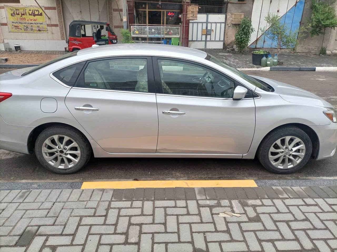 نيسان سنترا وارد امريكي 2019 محرك گير تبريد بوضع جيد حدادة جديدة بيها بارد بالباب وشخوط بسيطه بالبدي رقم بصرة حرة السعر 105 
*********** Singapore

نص مكتوب في الصور:
- 89 4G II.. 1 7:18 BidFax.info en.bidfax.info
- 89 4G II. 7:18 en.bidfax.info ٤٤ BidFax.info
- 89 4G 1: 7:18 BidFax.info en.bidfax.info ٤٤