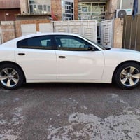 تشارجر SXT • وارد امريكي • خلفي متضرر