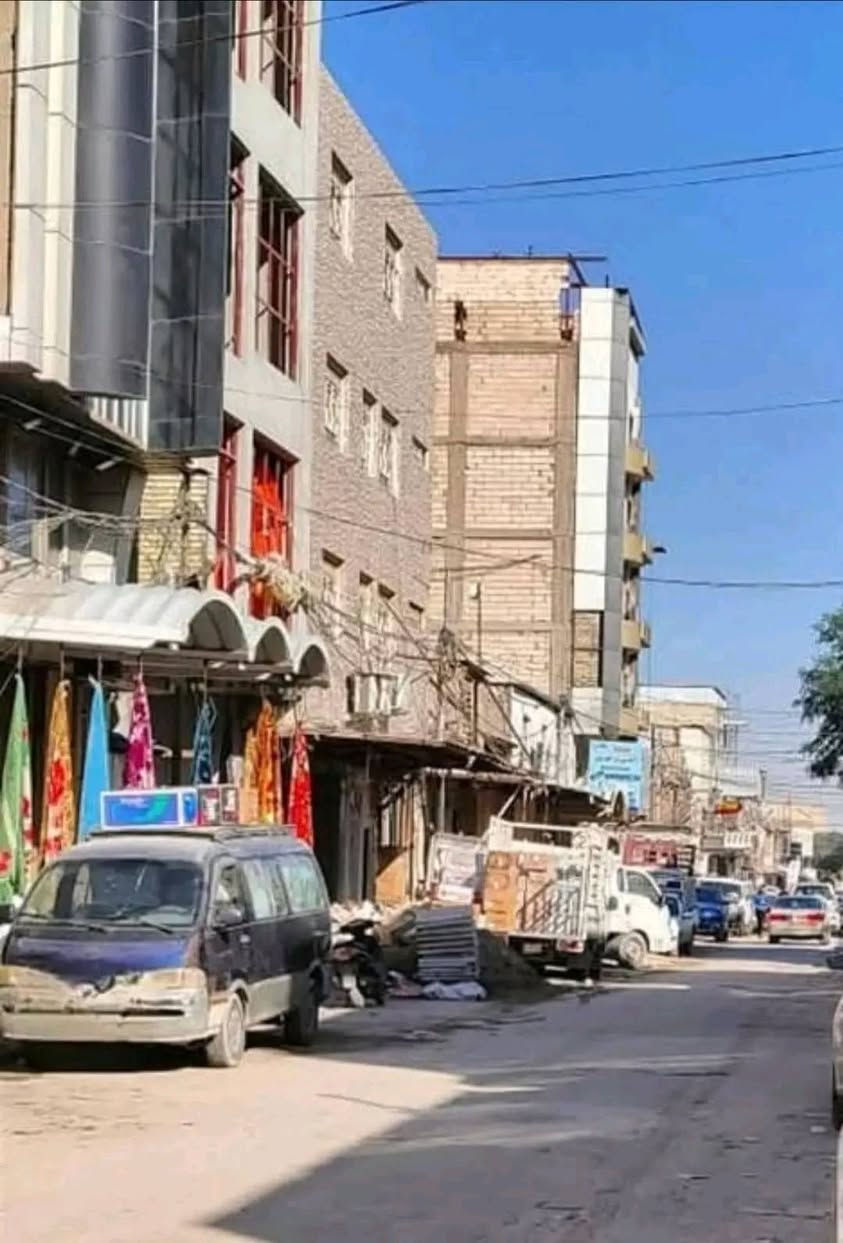 النجف • ٢٧٣م • بناية طابقين