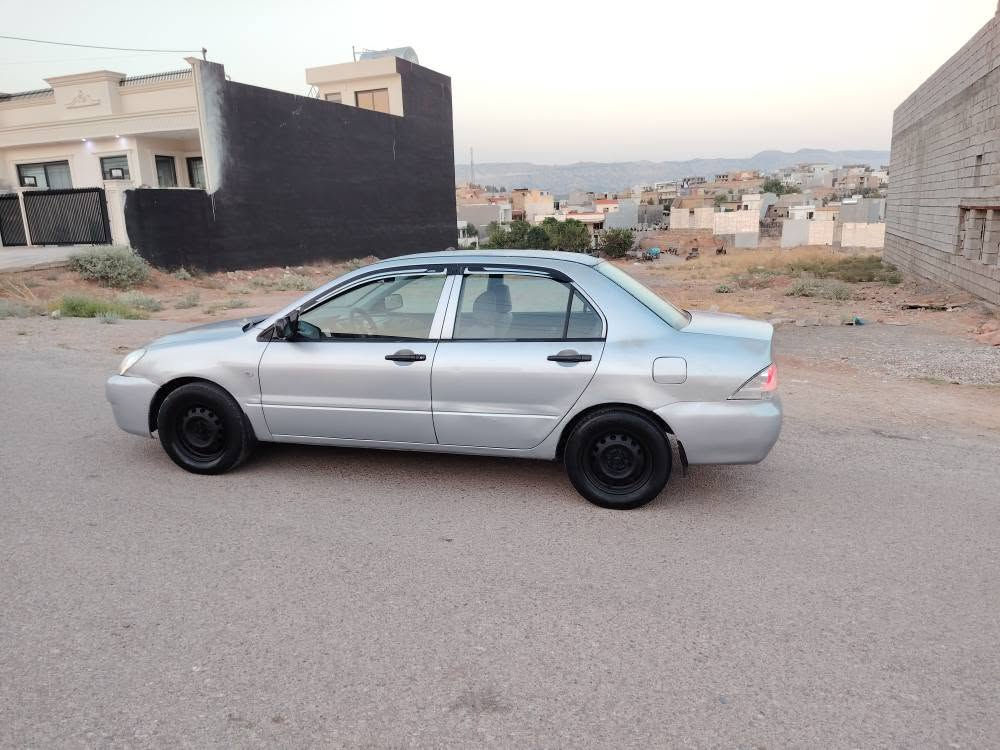*********** /*********** لانسر موديل 2007مه كينه بجوك توماتيك ره قه م هه ولير با٠ريك سه نه وي به سه ر جوه وكاله به نجه مور به شه رت ٤ بارجه سبوغ هيه ده عم ليدراو قورس نيه كويسينجاك, أربيل
