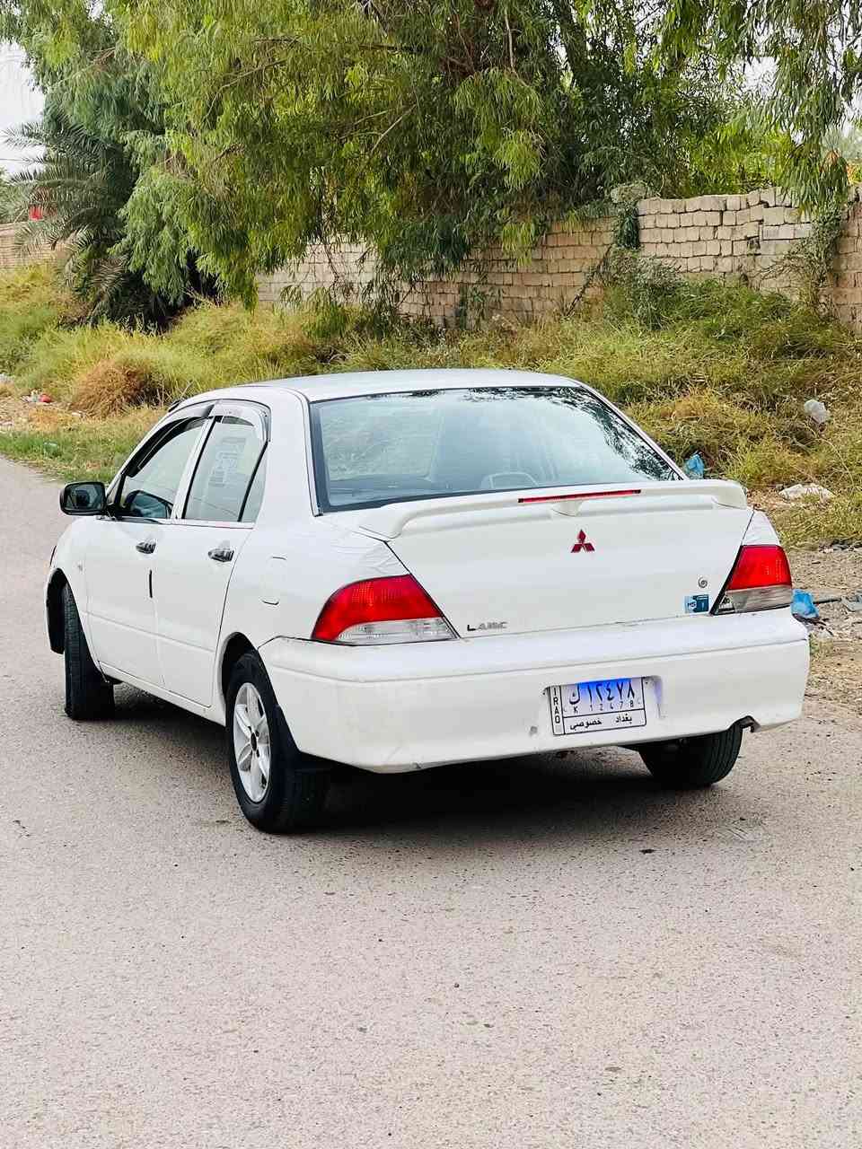 لانسر • ٢٠٠٢ • رقم بغداد