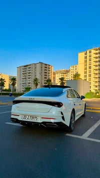 Kia K5  2023 خليجي وكاله NIM مواصفات Vip  -كشنات جلد لون ابيض+تحكم كهر...