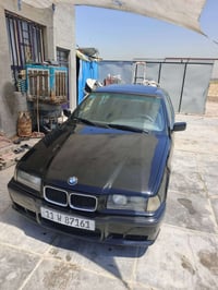 BMW E36 موديل 1992  لون اسود غير محدد  رقم بغداد انكليزي  مكينه 4 سلند...