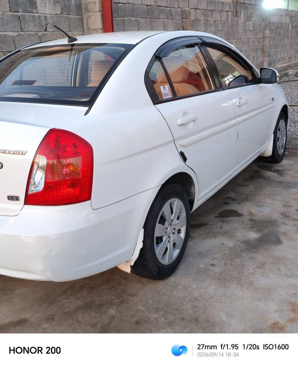 للبيع: هيونداي أكسنت 2011 (خليجي)
​المواصفات:
​المحرك: 1.6 بلادي (VVT)
​التبريد: شغال ممتاز (ثلج)
​المسافة المقطوعة: 191,000 كم 
رقم أربيل دولي. 
​السنوية: باسمي ومجددة لغاية 2030
​الاضرار والحالة:
​تبديل جاملغ أمامي يمين . 
​تعديل بارد في أماكن متفرقة. 
​السيارة جاهزة للاستخدام
​للتواصل :***********

نص مكتوب في الصور:
- HONOR 200 | Portrait