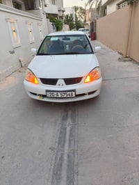 لانسر ٢٠١١ • رقم ديالى • مكينة ١٥٠٠