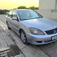 لانسر ٢٠٠٧ • توماتيك سلاید • سند لحد ٢٠٣٠