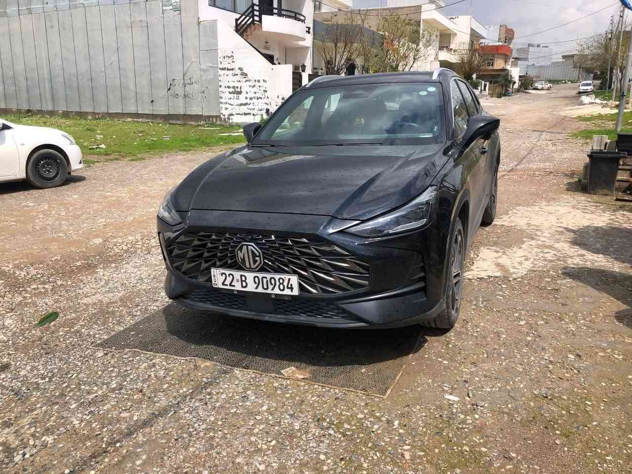 🚘 MG ONE 2024 LUX
لـــون الاســــــود مـــرغــوب

- **المحرك:** 1.5 لتر تيربو، 4 أسطوانات
- **القوة:** 181 حصان
- **العزم:** 285 نيوتن.متر
- **ناقل الحركة:** CVT أوتوماتيك
- **الدفع:** أمامي FWD
- **عدد المقاعد:** 5
- **سعة خزان الوقود:** 55 لتر
- **الجنوط:** 19 إنش
- **فتحة سقف:** بانورامــا كهربائية
- **الكاميرات:** 360 درجة
- **المقاعد:**sporty جلد لون الاسود +الاحمر +كـشن كهربائي
- **الشاشة:** شاشة رقمية + شاشة معلومات وترفيه
- **Apple CarPlay / Android Auto**
- **شاحن لاسلكي**
- **تشغيل عن بُعد**
- **دخول وتشغيل ذكي**
- **فرامل يد إلكترونية**
- **حساسات ركن خلفية**
- **مثبت سرعة متكيف (ACC)**
- **مراقبة النقطة العمياء**
- **تحذير الاصطدام الأمامي**
- **مساعد الحفاظ على المسار**
- **6 وسائد هوائية**
- **نظام ثبات إلكتروني ABS / EBD / TCS**
- **مصابيح LED أمامية وخلفية**
- **إضاءة داخلية محيطية**
***مـــاشـــیه 60km
 ــ. کــــــلین تــایتل بـــدون صبــغ بــدون بـــارد ورصــعات
شــــرط تـــحویل وغرامات 
مــــــــــــكان ســـیاره /كـــــركوك 
ســـــعره /155بــــیه مــــجال قلیل
*********** watsapp
***********

