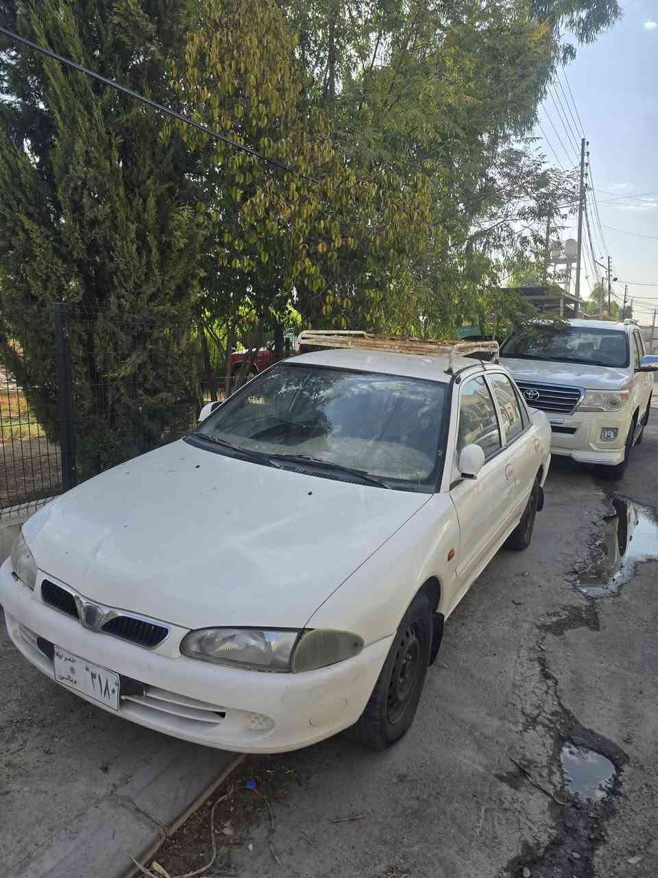 بروتون ويرا ٢٠٠٢
عربي
سيارة ماشية ٨٥ الف مكينة وكير كبس. بيها سبير وعدة كاملة. اشيائها كامل موجودة. بيها صبغ شبر بالجامرلغ والبنيد مثل ما موضح. 
المكان اربيل

کوردی
٨٥ هەزار رۆیشتیە مەکینە وگێر دەستکاری نەکرا. یەک شبری بۆیاغی هەیە لە بەنید وجامرلەغ.
جێی هەولێرە

للتواصل على الرقم : ‏‪***********‬‏
***********
السعر ٣٢ ورقة بيها مجال
