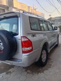 باجيرو ٢٠٠٣ للبيع او مراوس بسياره ناصيه محرك خير من الله بس كير بي عطل...