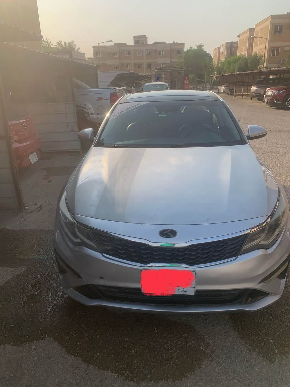 سلام عليكم كيا  اوبتما موديل 2019 رقم بغداد الماني ضربتها موضحة بالصورة مكان حلة  المجمع السكني طريق حلة نجف السعر 125 /كير محرك مكفولات فقط ضربتهة بأمريكا وموضحة بالصورة اي استفسار  اتصال ***********

نص مكتوب في الصور:
- 86 LTE 4:32 bid.cars 1 / 10 1:1