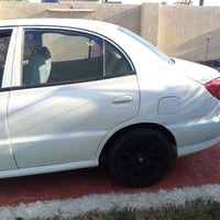 مرحباً شباب عندي كيا ريو موديل 2000 رقم بغداد دولي اسمي تبريد ثلج مكين...