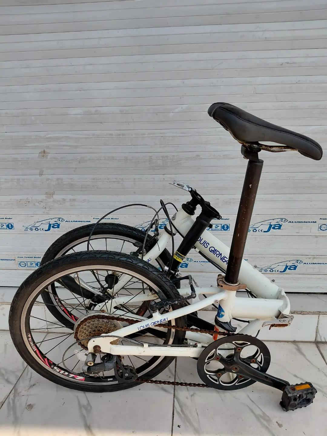LOUIS GARNEAU FOLDING BIKE حجم 20 المنيوم بالكامل    ✈يوجد توصيل لجميع المحافضات ✈ كركوك مدخل سايدين حي الاسرى والمفقودين  معرض ابو شيفان ( *********** )
