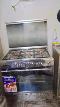 طباخ • قنينة غاز • ثنين أحمر وأصفر