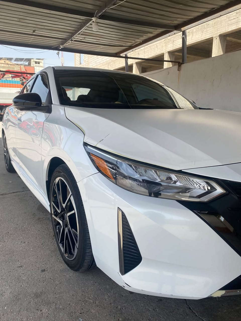 🚘 للبيع | نيسان سنترا SR 2024

Nissan Sentra SR 2024
🔹 اللون: أبيض صدفي 
🔹 الممشى: 37000
🔹 المحرك: 2.0 لتر / 2000 

 🔹 الرقم : أربيل 

⭐ المواصفات:
✔️ فتحة سقف 
✔️ تضليل سنوي مرخص 50 ‎%‎ صار ايام من صادر 

✔️ أضواء زينون
✔️ بصمة أبواب + تشغيل بصمة
✔️ تشغيل عن بُعد
✔️ شاشة كبيرة مع Apple CarPlay
✔️ كاميرات + حساسات + رادارات
✔️ أوضاع قيادة ECO / NORMAL / SPORT
✔️ والعديد من الإضافات الأخرى

🔧 حالة السيارة:

✅ حادث السيارة موضح بالصور يعني مبدل بنيد فقط تجاري 

💰 السعر:165$

📍 الموقع: الانبار - الرمادي 

📞 ***********
واتساب / اتصال

نص مكتوب في الصور:
- SMART CAR Vehicle Diagnostics المصد الامامي : لم يتم فحص الصبغ + مبدل تجاري المصد الخلفي : الدعاميات والقابلون ليس من ضمن الفحص PAGE2 سونار الكتروني فحص شامل صبغ-بارد-تحديد-تبديل الكهربائيات ناقل الحركة-المحرك الشاصي -اللنود *********** SMART CAR - سمارت كار الرمادي شارع ٦٠ قرب فلكة التخيل ملاحظة نحلي كامل مسؤولياتنا بعد انتهاء الفحص وتسليم التقرير الى الزبون SMART CAR غير مسؤول عن بيانات الفحص التي تتم خارج المركز اي وقت
- SMART CAR Vehicle Diagnostics الجانب الايمن : يوجد بارد + تكحيل في الاماكن المحدده الجانب الايسر: يوجد بارد + رصعات و خدوش في الاماكن المحدده القماره: يوجد رصعات و خدوش في الاماكن المحدده الدعامات والفابلون ليس من ضمن الفحص بارد كرت تكحيل صبغ معجون رصعات خدوش مفتوح تبديل ممتار SMART CAR سونلر الكتروني فحص شامل صبغ-برد-تكحيل-تبديل الكهربائيات ناقل الحركة-المحرك الشاصي -اللغود اسم العميل: محمد نوري تاريخ الفحص: 2026/4/24 وقت الفحص: 9:00 pm موبايل: رقم المركبة: 20681 اربيل نوع المركبة: سنترا الموديل: 2024 اللون: ابيض *********** SMART CAR - سمارت كار الرمادي شارع ٦٠ قرب فلكه النخيل ملاحظة / نخلي كامل مسؤولياتنا بعد انتهاء الفحص وتسليم التقرير الى الزبون ان SMART CAR غير مسؤول عن نتائج الفحص التي تقع خارج المركز في اي وقت