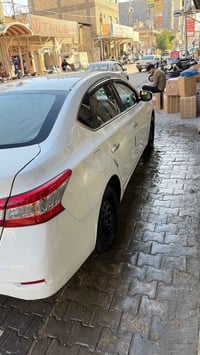 نيسان سنترا كوري مديل 2013 سياره جاهزه من كلشي بيهة بس قبق الجنطه مبدل...