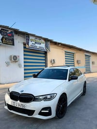 Bmw 330 ام باكج اصل موديل 2022  فول مواصفات   فتحة سقف  داخل احمر بلاد...