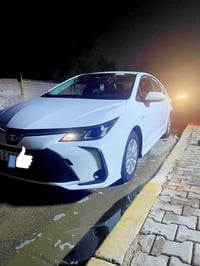 كورلا موديل 2025  بدون فتحه كشن كهرباء داخل احمر ماشية 48 مكاني بغداد ...