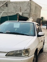 بيجو ٣٠٦ • ٢٠٠٢ • رقم بغداد دولي