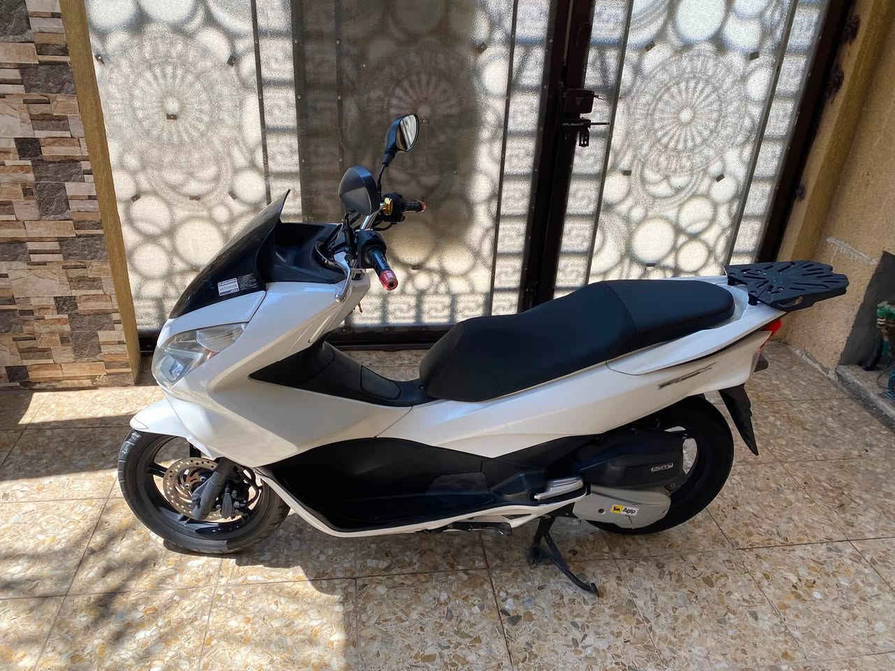 السلام عليكم Pcx  جيل الثاني ياباني  مكفوله كفاله عامه  مكينه 125حساس ازدحام وحساس ستان  دراجه مال جناي ماشيه 20 ألف دراجه خير من الله جيب فيتر وتعال شوفها  السعر ب13  رقم الهاتف***********العنوان بغداد الغزاليه
