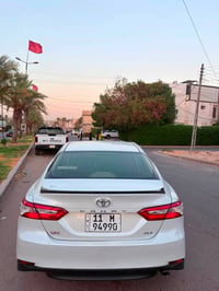 كامري GLE وكالة ساز بانزين فقط 2020 ماشية 140 الف مكفولة من الصبغ مكان...