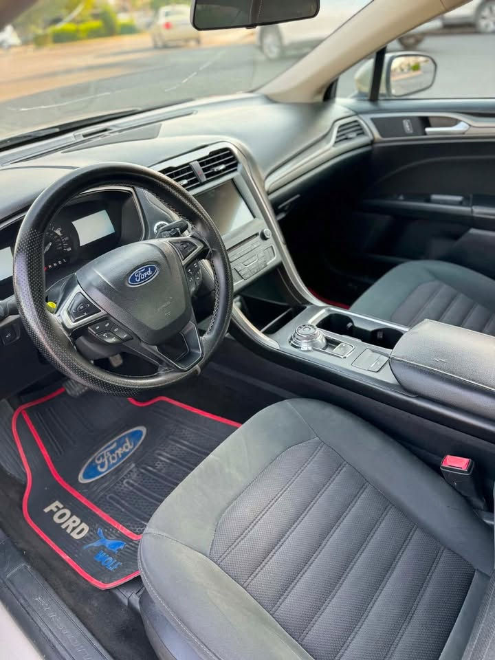 السلام عليكم ورحمة الله وبركاته
‏‎       ——— لـلـبـيع  ———

‏‎ فورد فيوچن .      —     Ford Fusion
‏‎وراد أمريكي.        —  بدون ايرباك 
‏‎الموديل               — 2018

فئة                      — SE  
حجم المكينه       — V4/2500 تنفس طبيعي 
المسافه 168000كيلو

حالة السياره.  ( صور الحادث داخل المنشور

‏‎المواصفات 

‏‎- بصمة تشغيل

-بصمة أبواب 

‏‎-ترحيب عند الاقتراب 

-ليد نهاري 

‏‎- شاشه كبيره تدعم نظام الأبل كار باي ونظام الاندرويد 

‏‎- شاشه عداد 

‏‎- ستيرن بحركه كهربائيه 

‏‎-تبريد منفصل 

-تبريد قطعتين 

‏‎- بگ لايت LED 

‏‎- كود باب 

‏‎-تحكم ستيرن جهتين 

‏‎-تحديد سرعه 

‏‎-مانع انزلاق 

-حساس خلفي 

-كرسي السايق والراكب بحركة كهربائيه 

‏‎-ليد نهاري

‏‎-گير ماوس 

‏‎-كامره خلفيه دواره

‏‎باقي المواصفات المعروفه 

رقم السياره    — أربيل 
رقم الهاتف ***********
