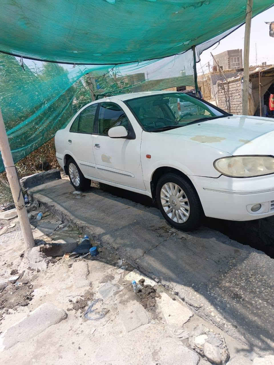 نيسان صني 2009ياباني جاهزه محرك حداديه تبريد دواخل كهربايات كله كفاله السعر 35بيه مجال***********
