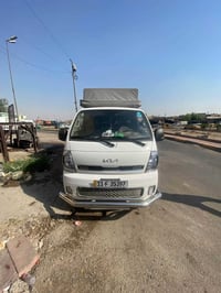 ‏كيا بنجو 2700 ‏موديل 2025 ￼ماشي 40,000 رقم بغداد السعر 158 ورقة التوا...