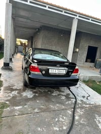 كامري 2004  كير محرك بشرط جاهزه من كلشي تبريد تدفئه  سعر 85وبيهه مجال ...